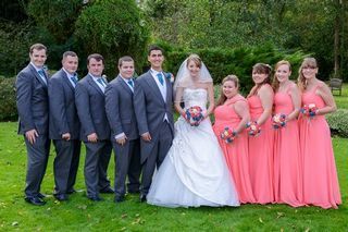 Bridal party in garden of Bear Hotel in Hungerford